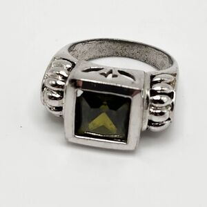 Size 6 Sterling silver marked 925 green stone large setting.   Filigree